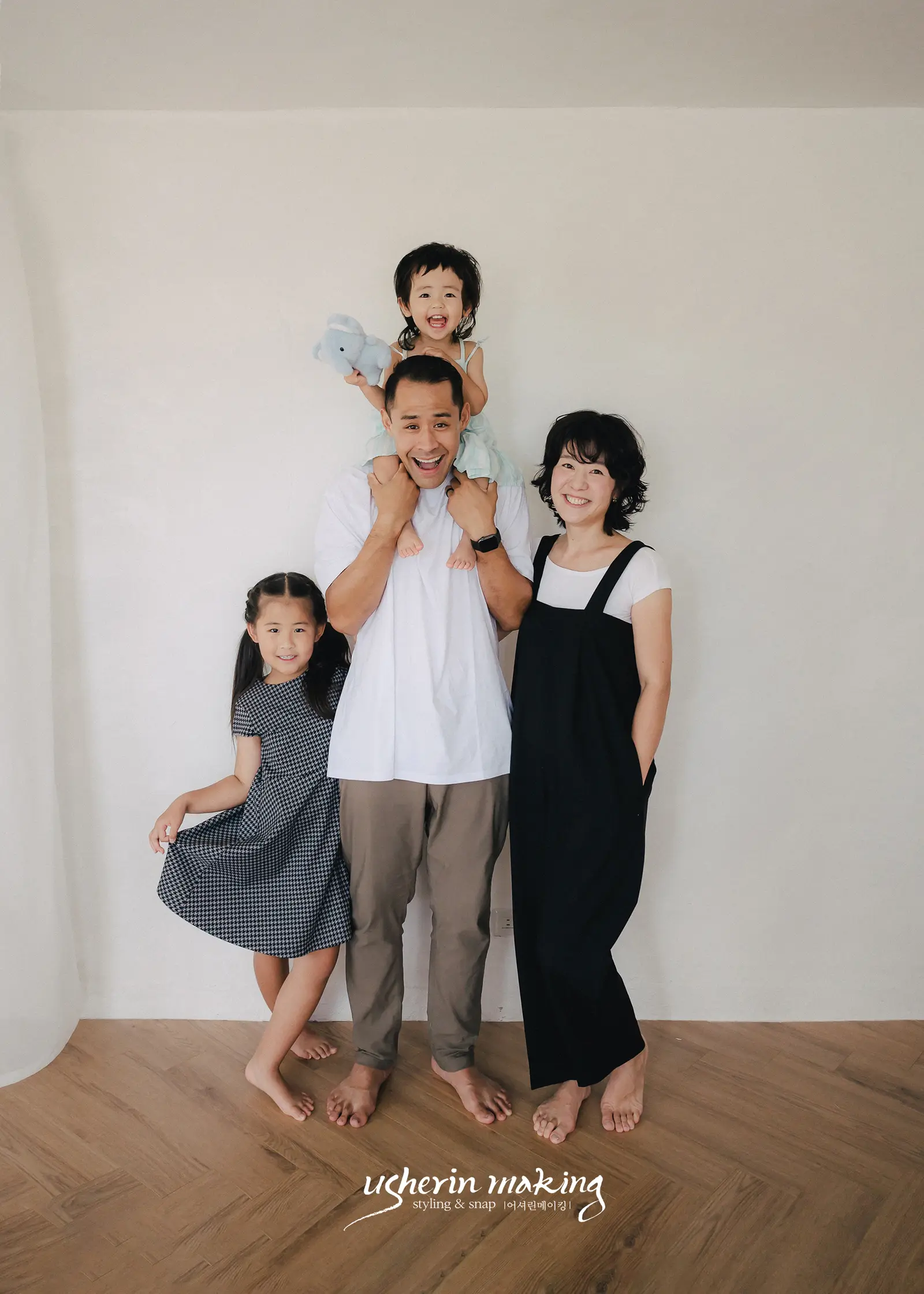 family-standing-studio.jpeg
