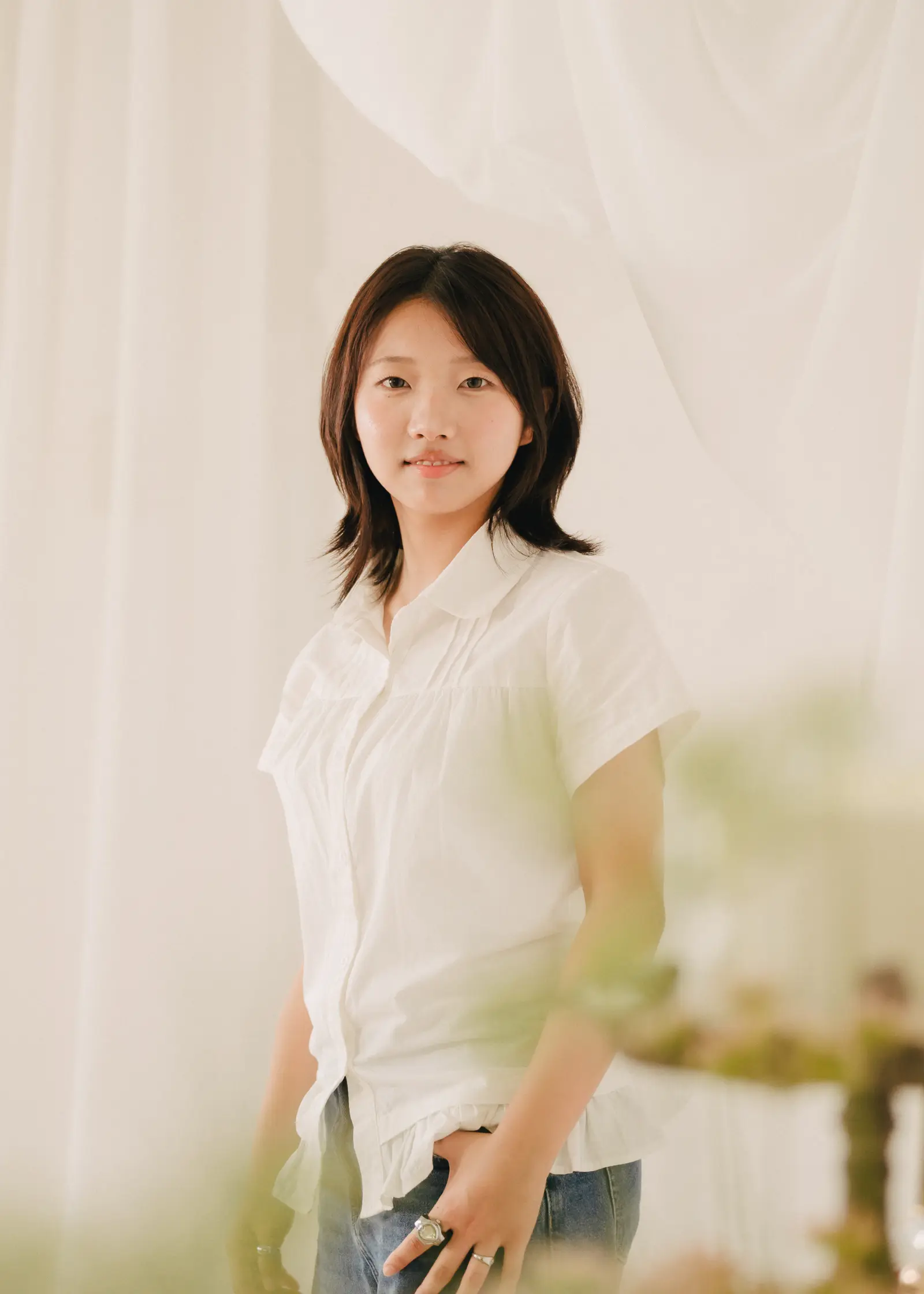 portrait-woman-white-shirt-blur.jpeg